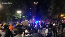 Protesters run as police threaten to fire tear gas in Portland
