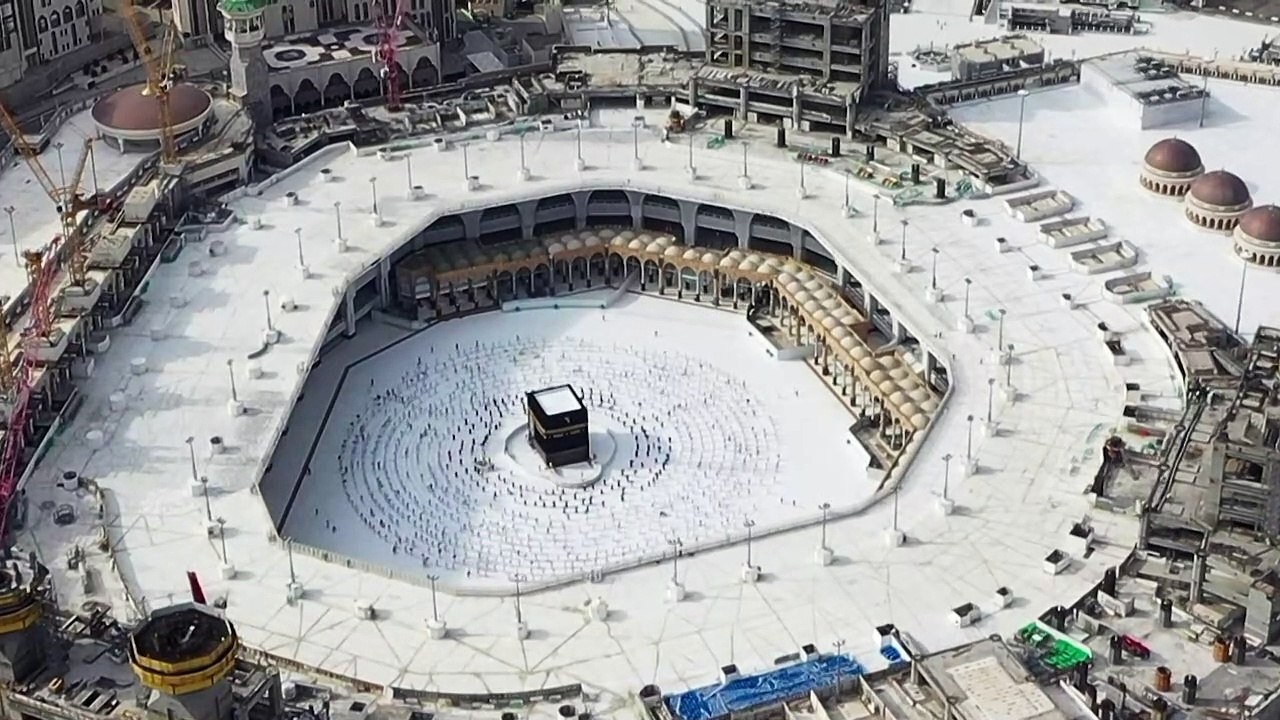 Muslim pilgrims circle Mecca's Kaaba
