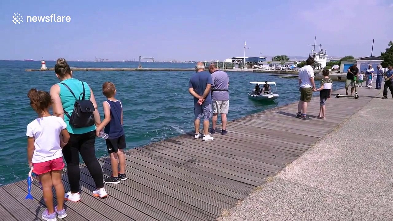 Divers retrieve dozens of electric scooters fro...