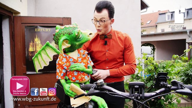 Fahrradfahren mit Melvin dem Drachen Ferienbeschäftigung im Sommer 2020 mit Bauchredner Roy Reinker - WBG Zukunft eG - Karrideo Imagefilm-Produktion©®