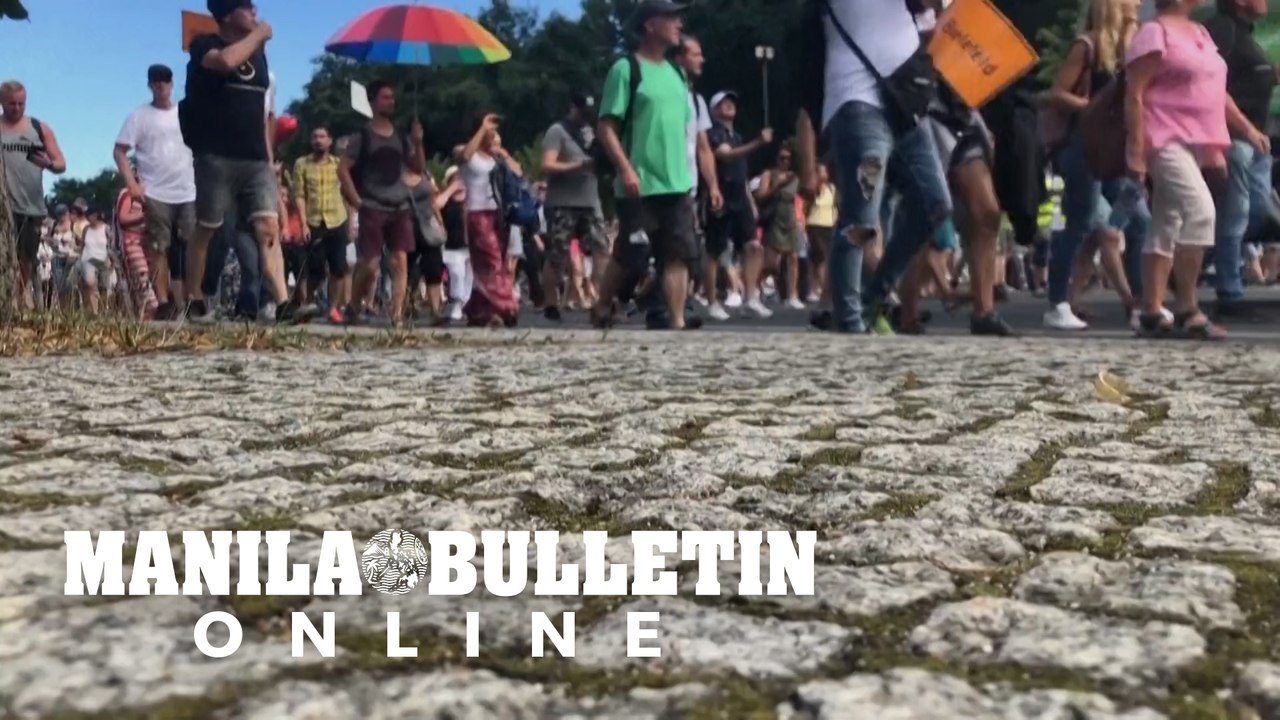 Berlin protest over virus restrictions draws thousands