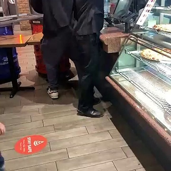 Irate Man Destroys Pizza Display
