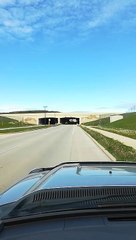 Tunnel Removes Raised Dump Truck Bed