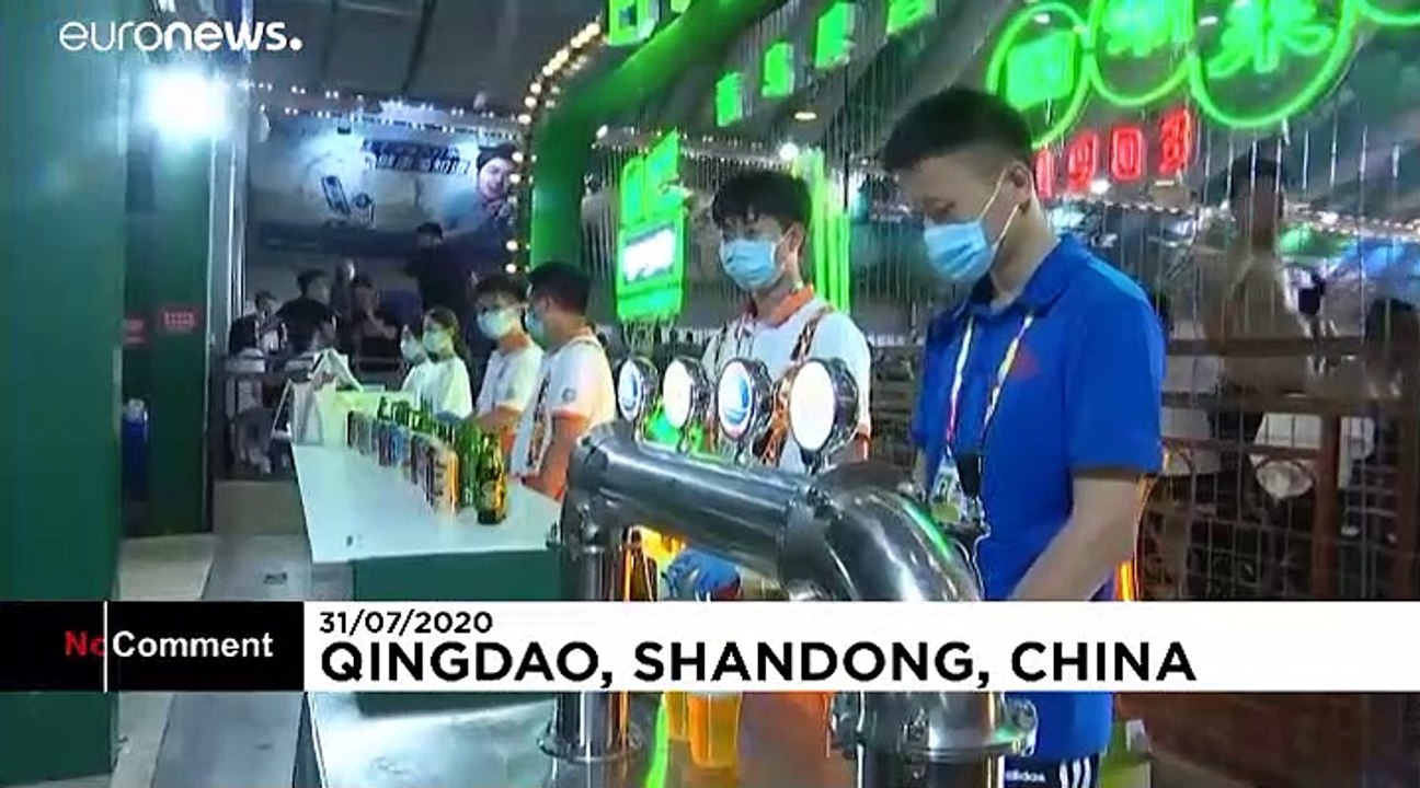 Chinese beer lovers leave face masks behind as festival opens