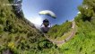 Slovakian speedflyer glides dangerously close to treetops on French mountain