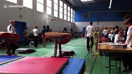 Young French gymnast painfully runs into pommel horse at full speed