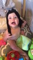 Baby Keeps Pulling Top Above her Head Trying to Wear it Off