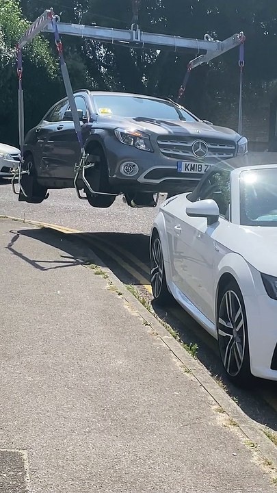 Illegally Parked Car Gets Carried Off