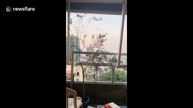Broken glass from massive Beirut blast in Lebanon highrise apartment