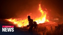Massive wildfire in southern California continues to rage amid scorching heatwave