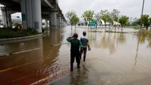 Flash floods, mudslides kill 13 people in South Korea