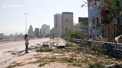 Helicopters put out fire at the scene of Beirut port explosion