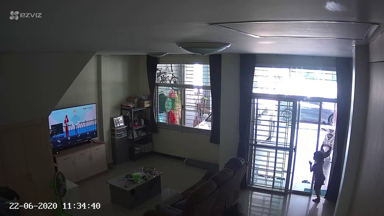 Girl runs through glass door