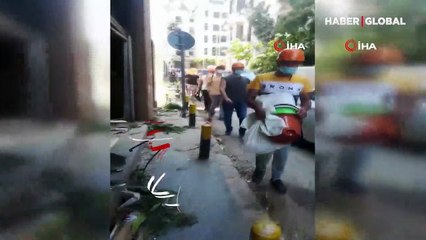 Yaralarını saran Beyrut'ta halk sokakları temizliyor