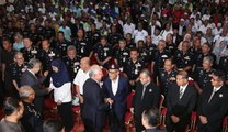 Najib delivers good news to police pensioners