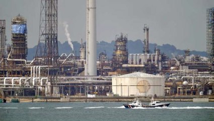 11 men charged over Singapore Shell oil heist