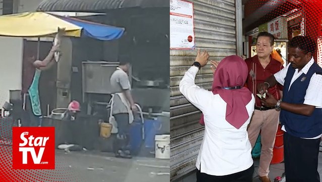 Worker caught in fish smashing act in back alley of Kota Kemuning restaurant
