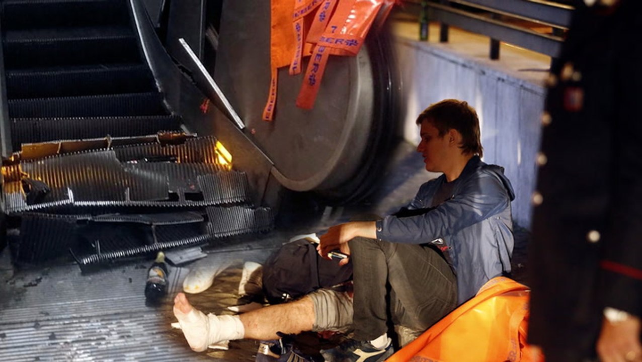 Out-of-control Rome escalator leaves football fans in a tangled crush
