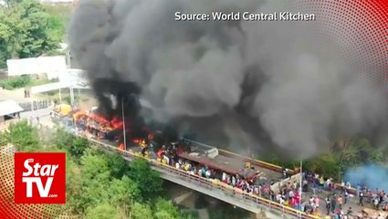 At least two people killed as Venezuela troops block aid