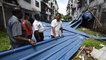 Zinc roof of low-cost flat block blown off by strong winds