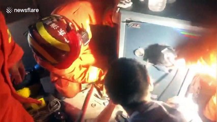 Chinese firefighters free 7-year-old from safe after she gets locked inside while playing hide-and-seek