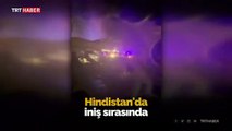 Hindistan'da iniş sırasında pistin dışına çıkan uçak ikiye bölündü