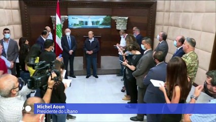 Presidente libanês cita "negligência" ou "míssil" como causa de explosão