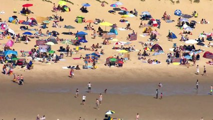 Sun seekers flock to Camber Sands and Brighton Beach