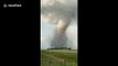 New dramatic footage shows huge tornado hitting farm in Canada