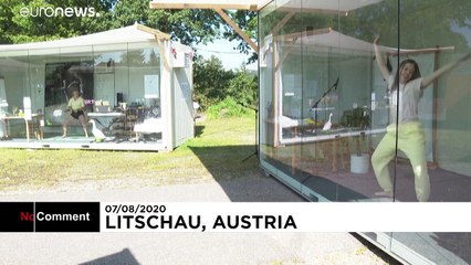 Artists in Austria lock themselves in glass rooms for 14 days to mimic quarantine