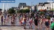 Brits race to beaches amid two mile queues to bag spot in 32C sun as coastal roads become gridlocked