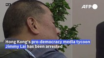 Hong Kong police raid pro-democracy newspaper and arrest owner under national security law