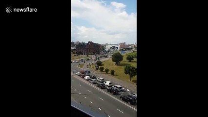 Cars honk as large convoy of military vehicles descend on Minsk