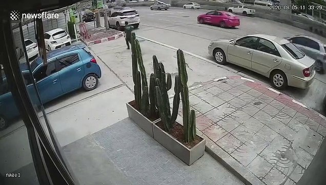 Heart-stopping moment car rolls backwards through busy five-lane carriageway