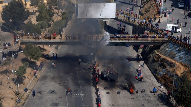 Opposition blocks roads, demand election goes ahead