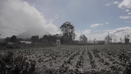 Volcanic ash coats village