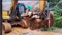 Vehicles and bodies recovered after deadly landslide in southern India