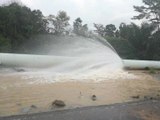 Burst water pipe results in partial flood on Pasir Gudang Highway