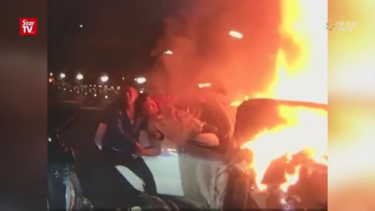 Ex-firefighter saves three from car accident blaze