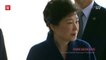 Park says 'sorry' as she heads for questioning