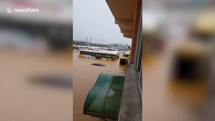 Cars submerged by deadly monsoon floods in South Korea