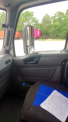 Semi Squeezes Into Tight Spot to Weather Storm