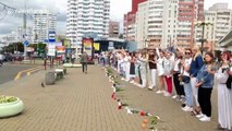 Women gather in Belarus capital to lay flowers for victims of police violence on protesters