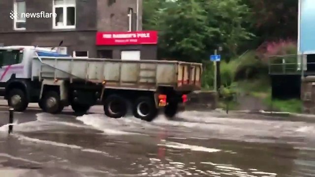Vehicles submerged in water as flash floods cause chaos across Scotland