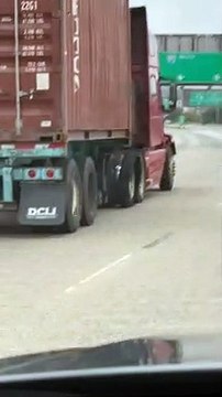 Truck Drives Along Highway With Major Damage
