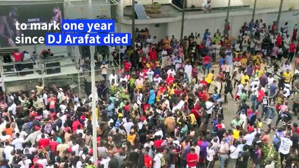 Thousands of fans dance to mark one year since DJ Arafat's death