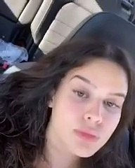 Girl Touching Her Tongue To Her Eyes