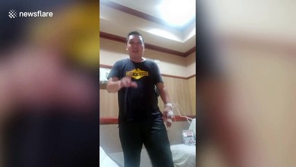 Covid-19 patient stays upbeat by dancing alone in hospital isolation room