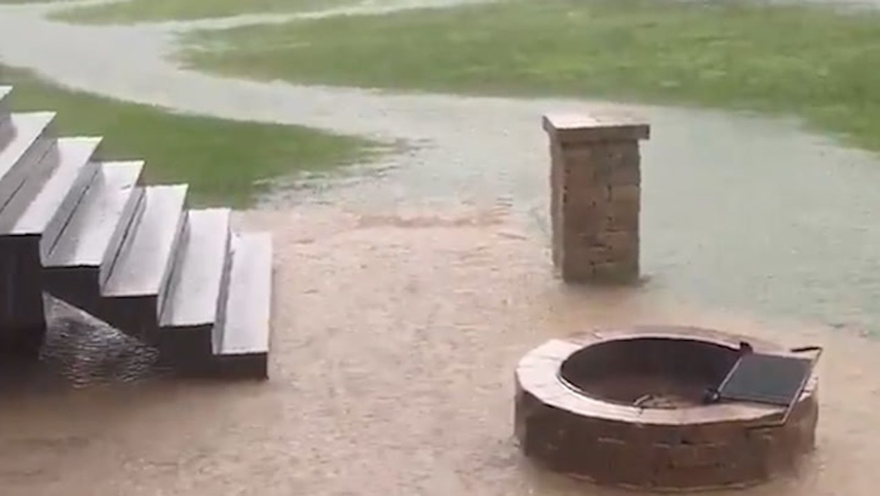 Devastating downpour does a number on backyard