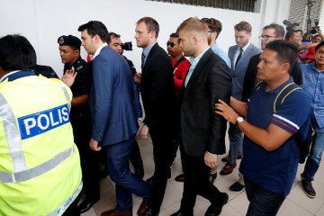 'Budgie Nine' walk free after guilty plea and apology